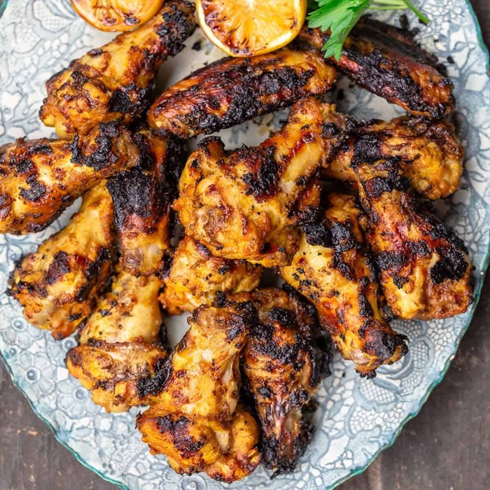 Sauced buffalo wings with blue cheese dip