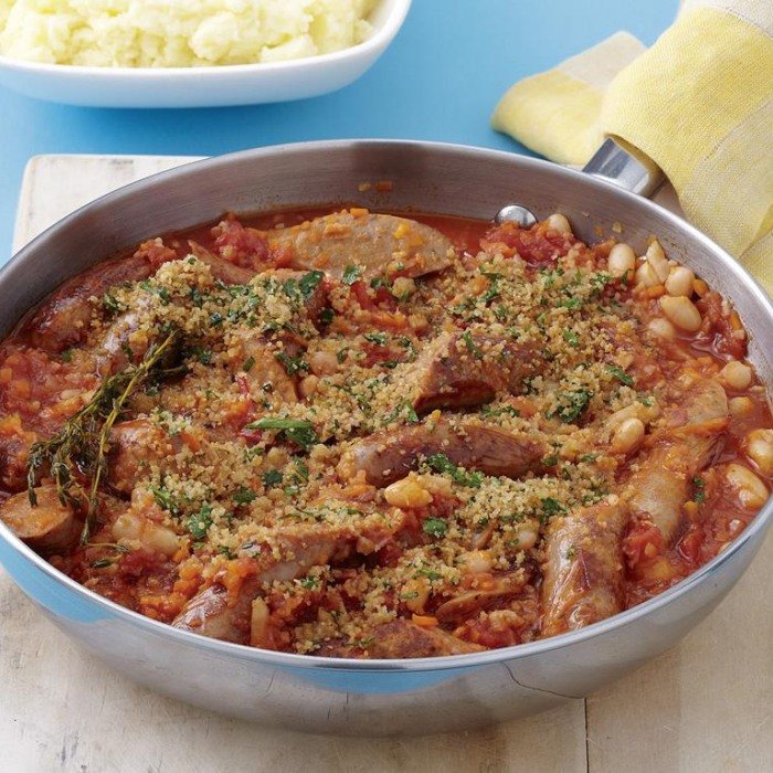 Crispy carnitas served with tortillas and lime