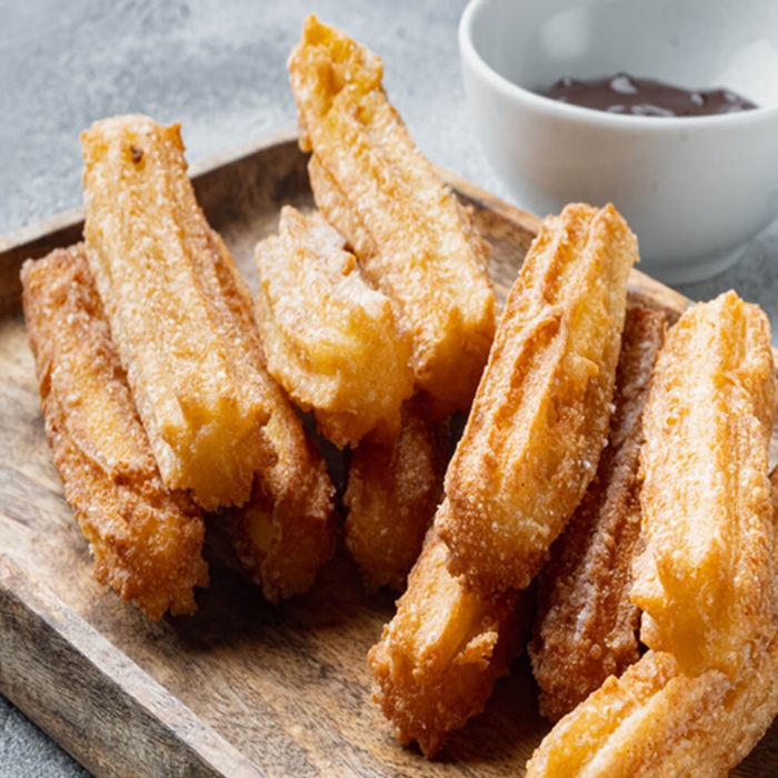 Cinnamon sugar churros with chocolate sauce