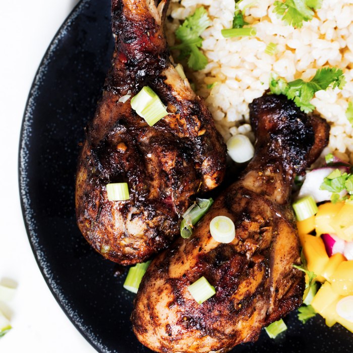 Grilled jerk chicken with charred edges